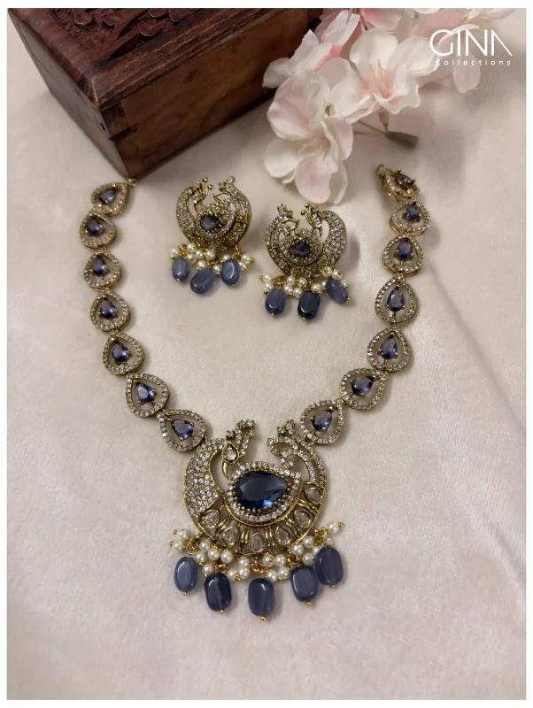 Premium-Purple-Peacock-Motif-with-Sea-Green-and-Pearl-Drop